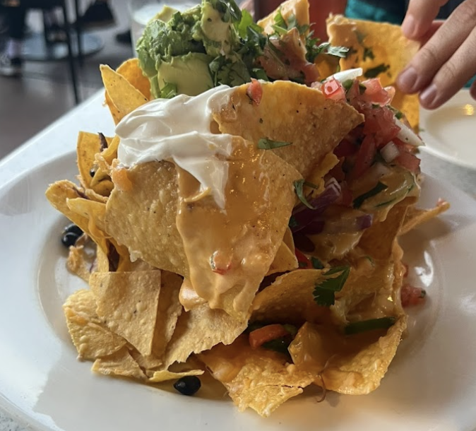 The Vault Uptown signature dishes Trash Can NachosBaby Back RibsSteakhouse Smash Burger